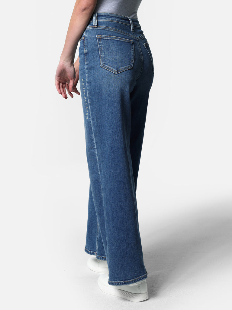 Woman wearing Wide Leg Medium Wash Jeans