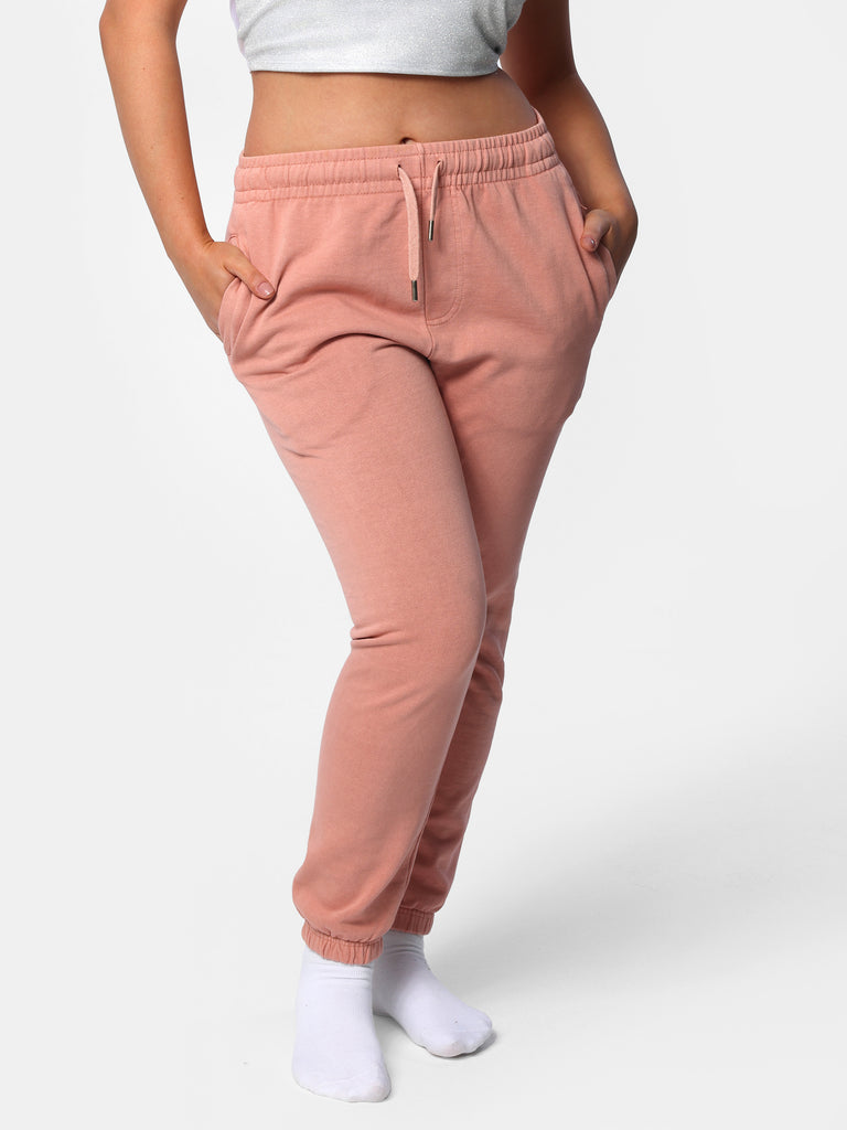 Woman wearing Pink Peach Bedazzled Joggers