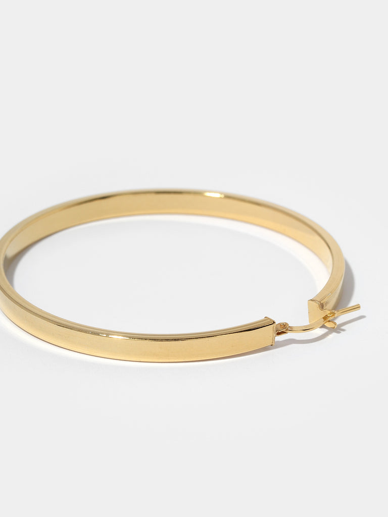 image of gold hoops with flat shape