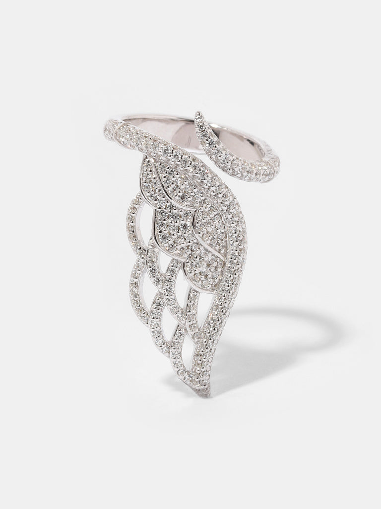 Product shot of a pavé angel wing swirl ring