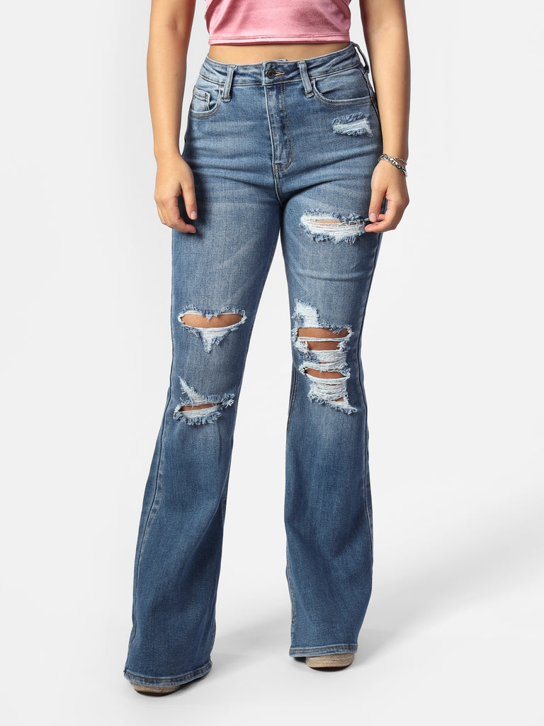 Woman wearing Stacey's Star Medium Wash Distressed Flare Jeans