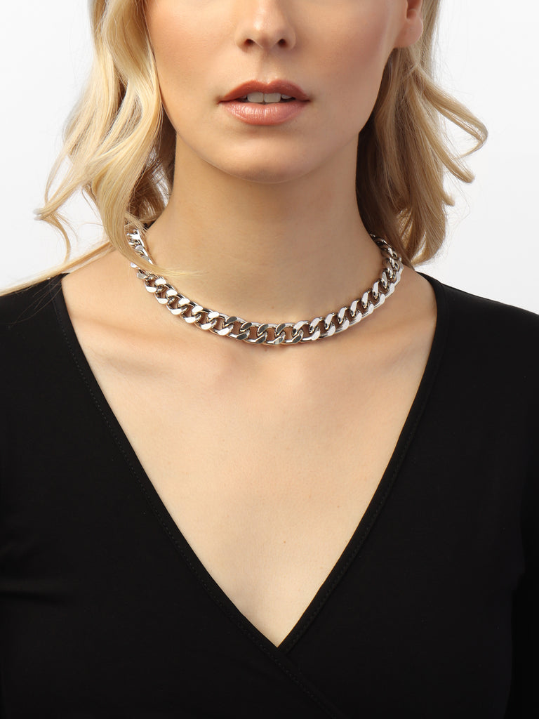 woman wearing large link chain necklace