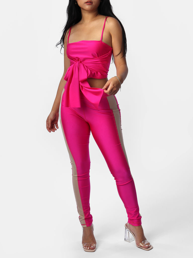 Woman wearing Darcey's Pink Satin Bow Top & Leggings