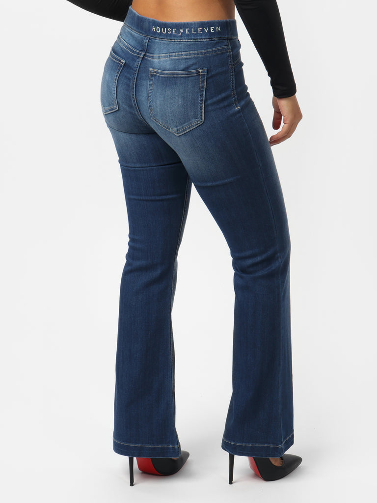 Woman wearing Stacey's Mid-Rise Flared Skinny Jeans