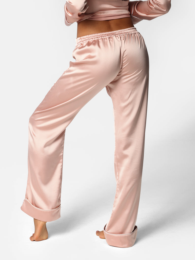 Woman wearing Pink Satin Pajama Set