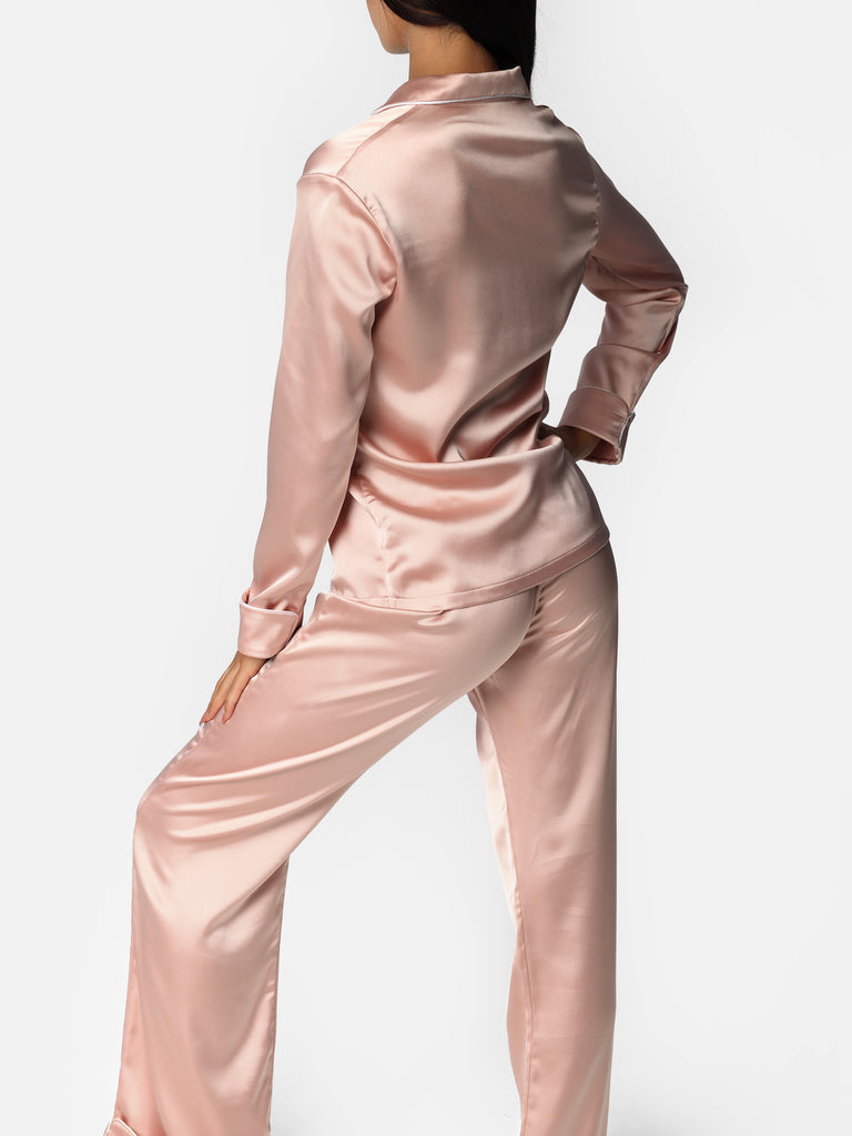 Woman wearing Pink Satin Pajama Set