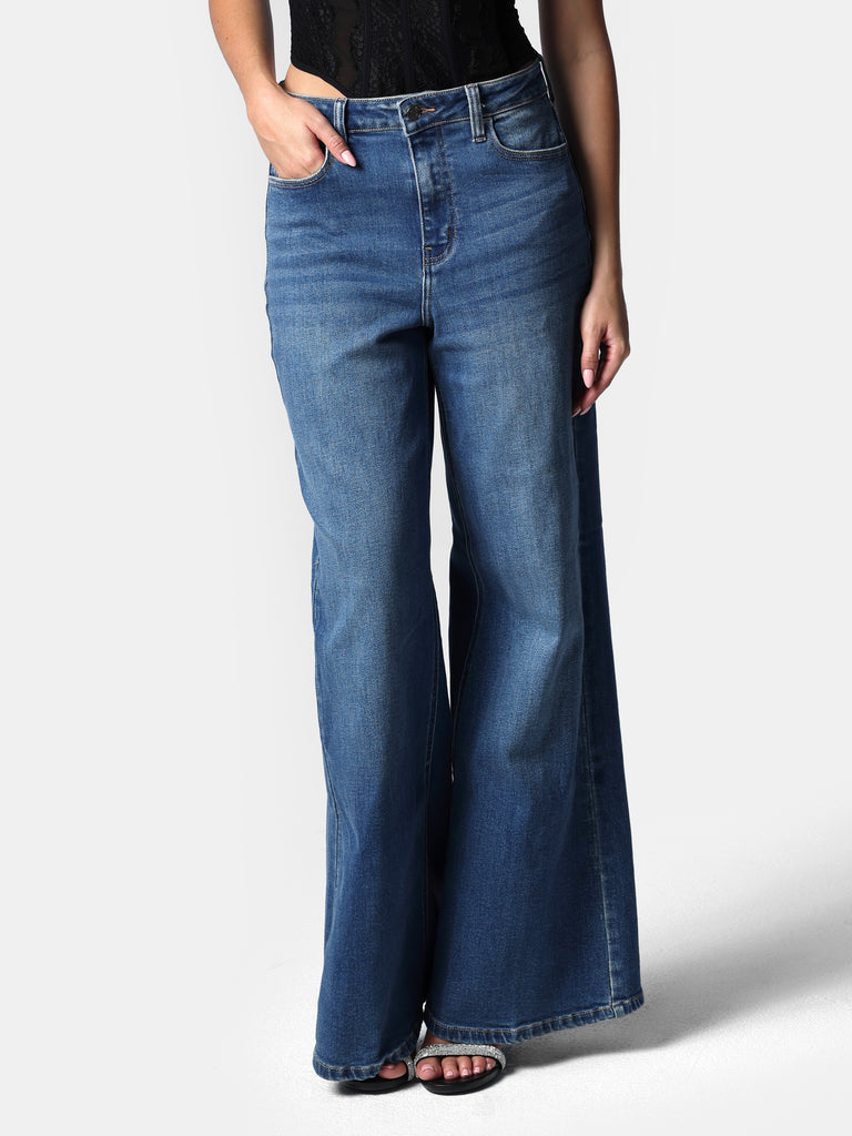 Woman wearing Wide Leg Medium Wash Jeans