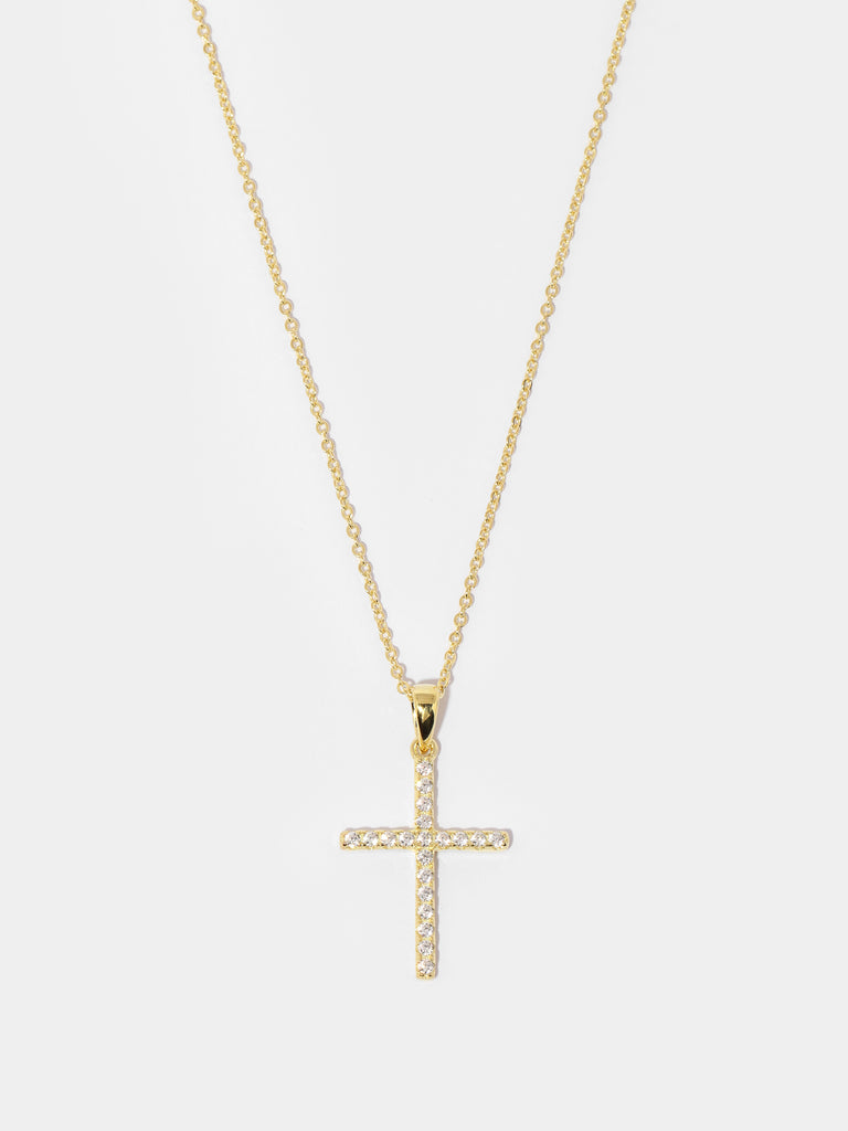 gold necklace with cross pendant covered in small, round, clear-colored crystals