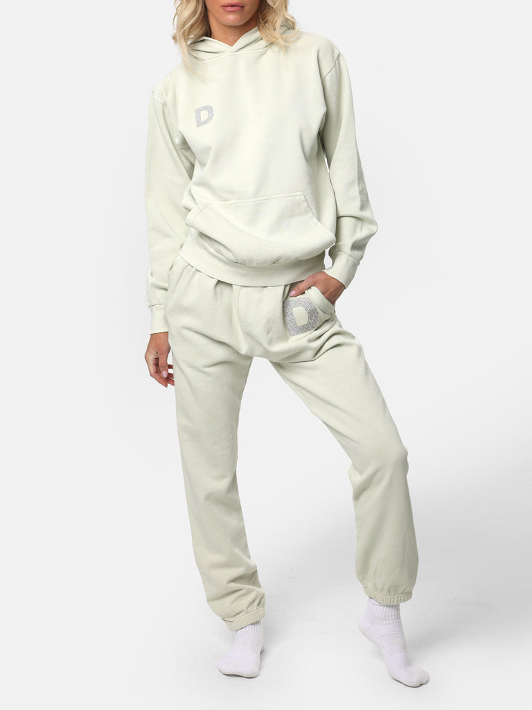 Woman wearing Bedazzled Initial Pistachio Hoodie