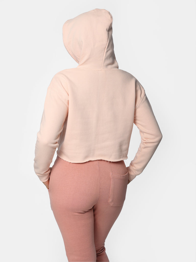 Woman wearing Baby Peach HOF11 Bedazzled Cropped Hoodie