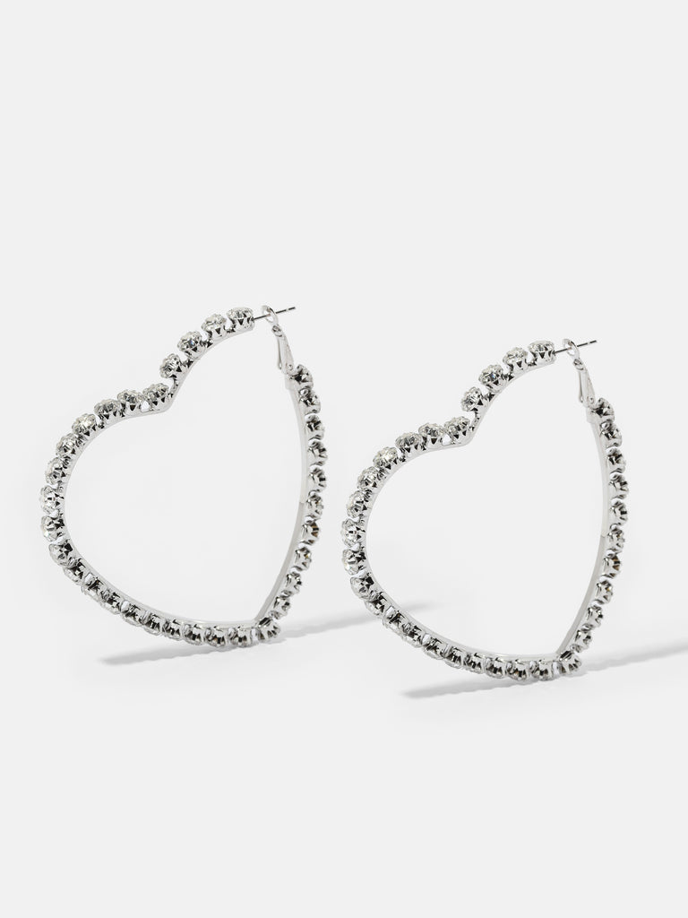 Product image of silver heart-shaped hoops with crystals