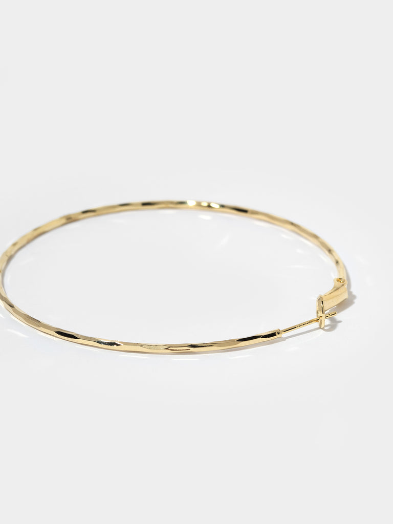 image of thin gold hoop earrings