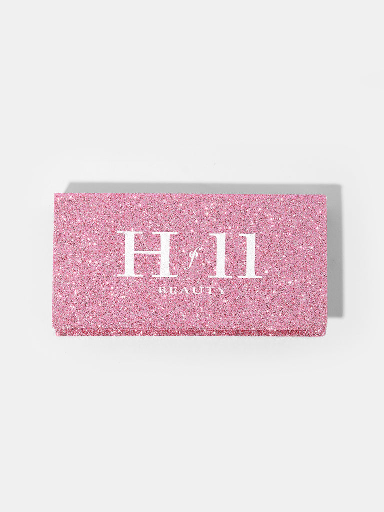 a pink glitter box with HOF11 logo and beauty text