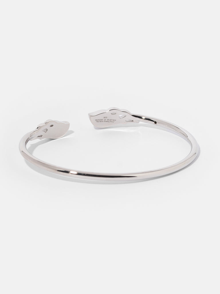 silver bangle bracelet with angel wings on the ends