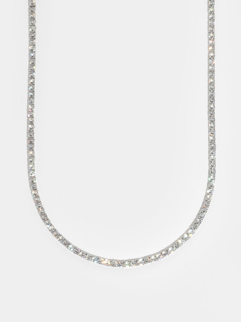 silver necklaces with round clear-colored, crystals all around