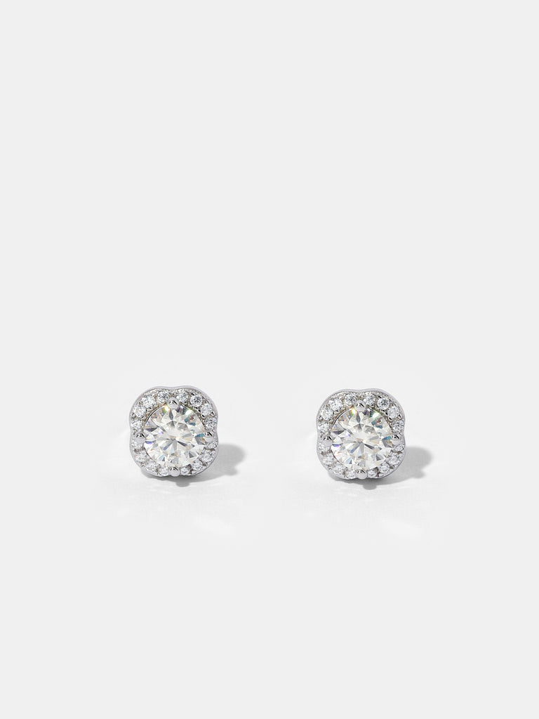 Image of silver stud earrings with large square shape clear-colored gem outlined by smaller clear-colored gems