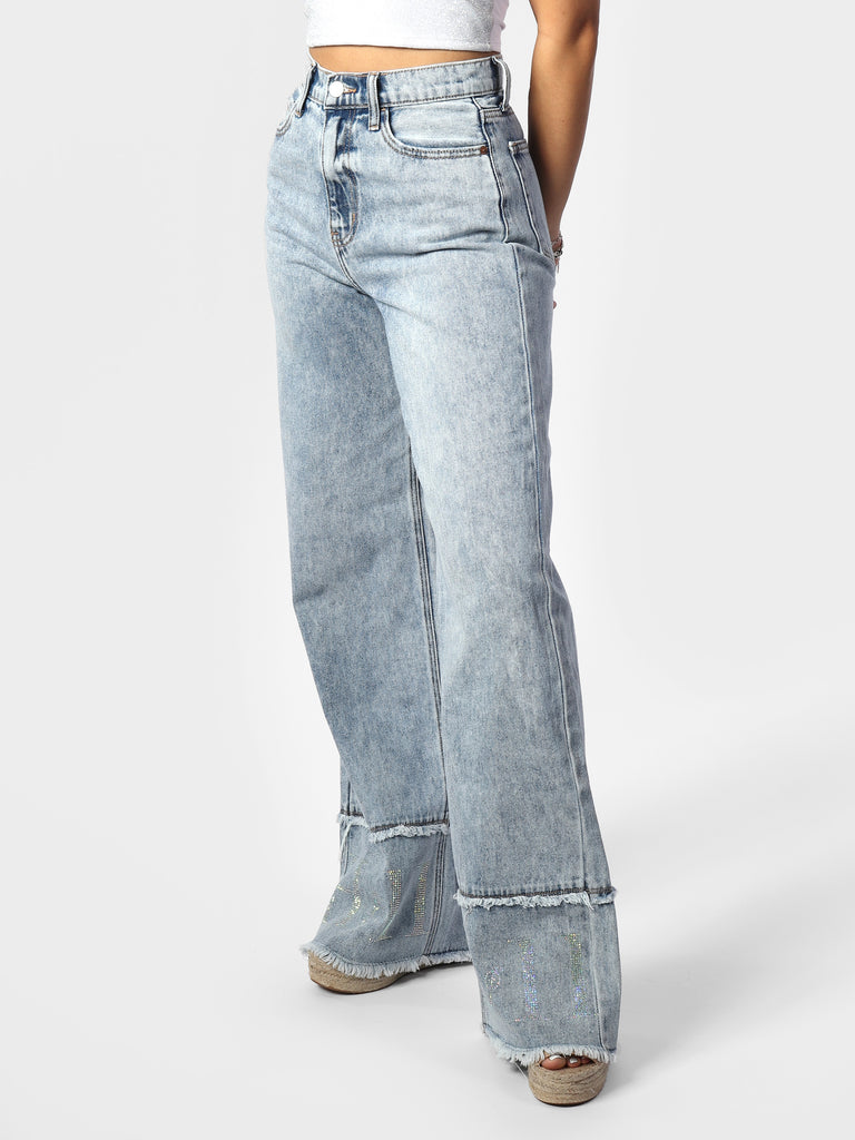 Woman wearing Stacey's Frayed Wide Legged Denim Jeans