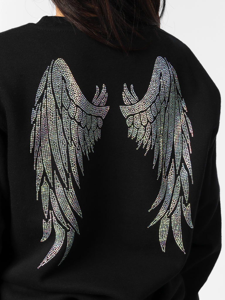 Woman wearing Black Sparkle Wings Sweater