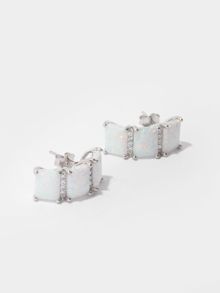 silver stud earrings with 3 square shaped opal gems and two columns of clear-colored crystals in between them