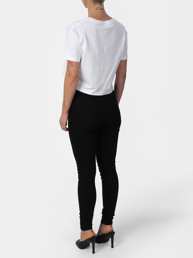 Woman wearing White House of Eleven Embroidered Cropped Tee