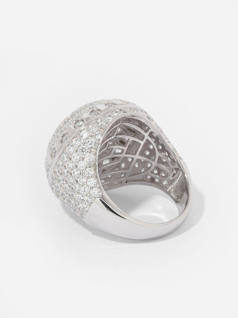 "Image description: A pavé set dome cocktail ring with an iced-out design, crafted to sparkle from various angles. The ring is made of high-quality cubic zirconia crystals, set in solid .925 sterling silver with rhodium plating. Suitable for sensitive skin, this ring is made in Los Angeles."