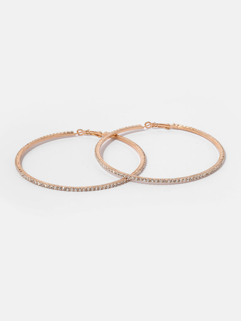 gold hoops lined with small clear crystal gems
