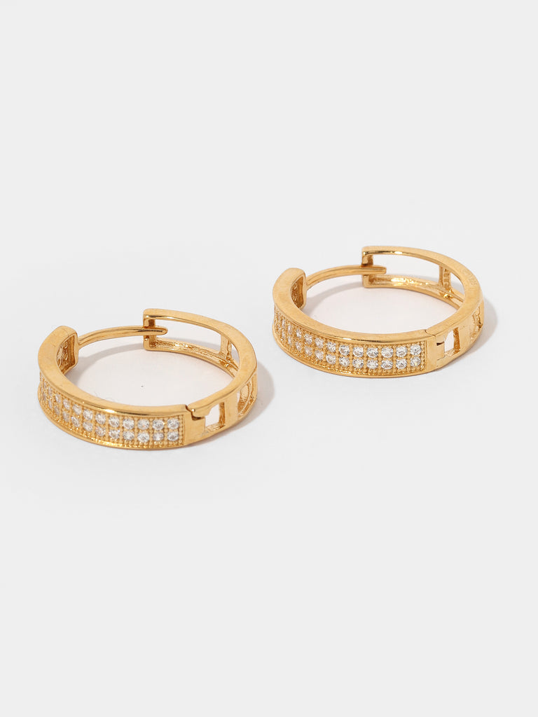 gold hoop earrings with the front covered in small round clear-colored crystals and the back is hollow lattice shape