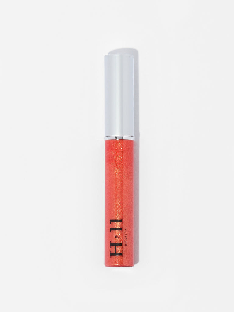 Flirtatious Shades Lip Gloss Wand in shade orange fizz